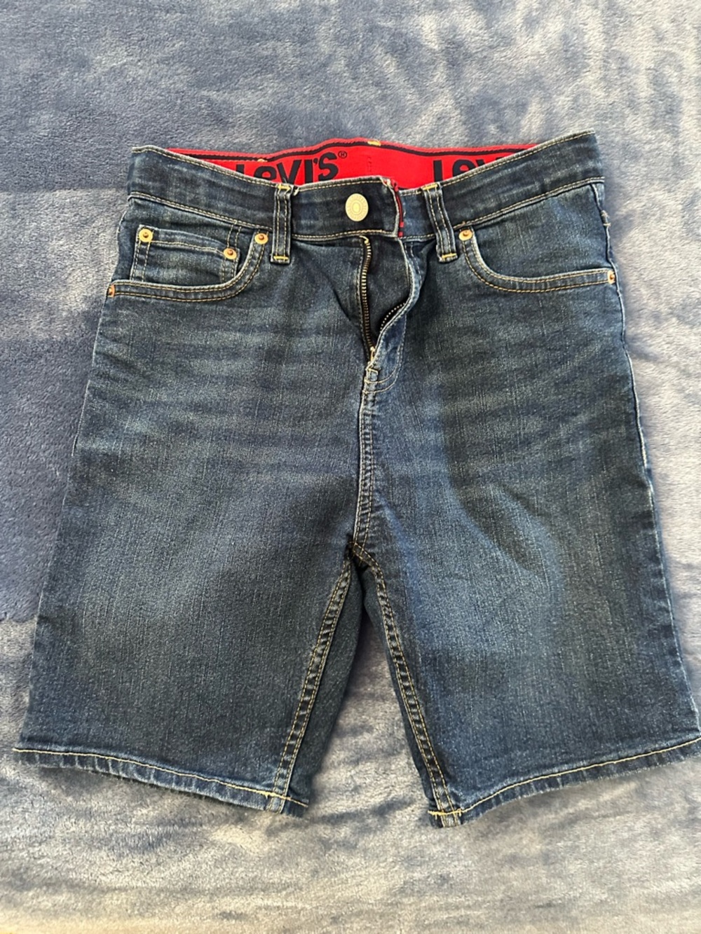 Levi's Dark Blue Denim Shorts with Red Waistband Accent